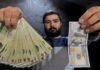 Iranian currency to an all-time low against the dollar