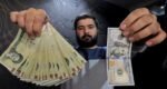 Iranian currency to an all-time low against the dollar
