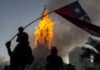 Violent protesters in Chile set the church on fire