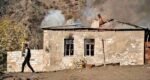 Nagorno-Karabakh people burning their own house in Armenia