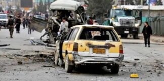 13 people killed in road blasts