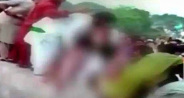 Pakistan Mob tore clothes of woman