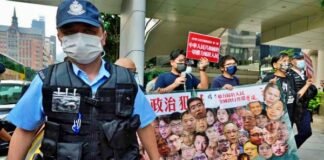 pro-democracy protest by four people