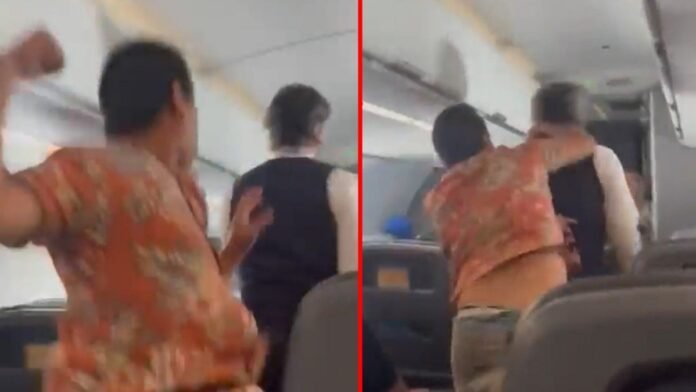 Passenger punching flight attendant