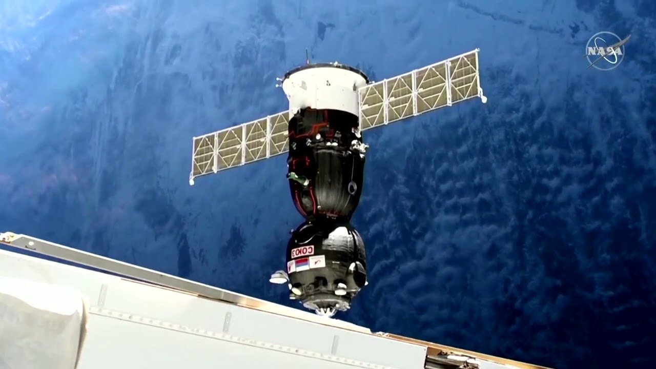 Space: Soyuz spacecraft docks with stranded astronauts
