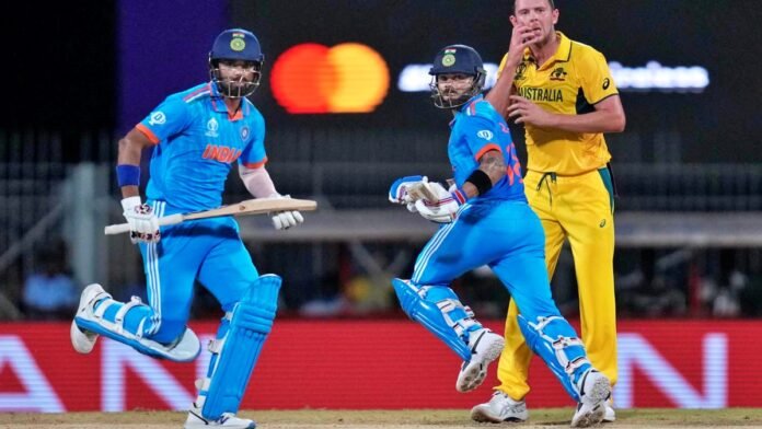 Kohli and Rahul shine as India beat Australia in World Cup opener