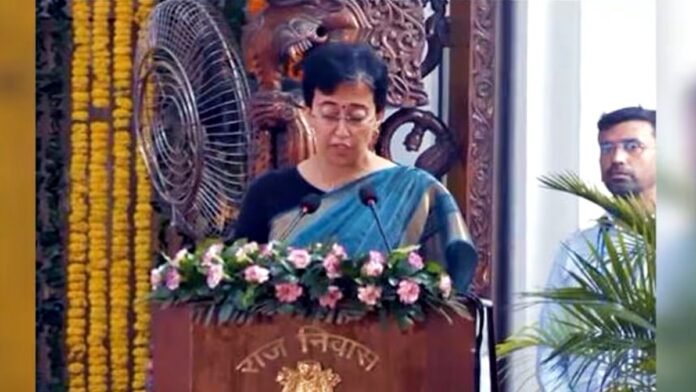 Atishi takes oath